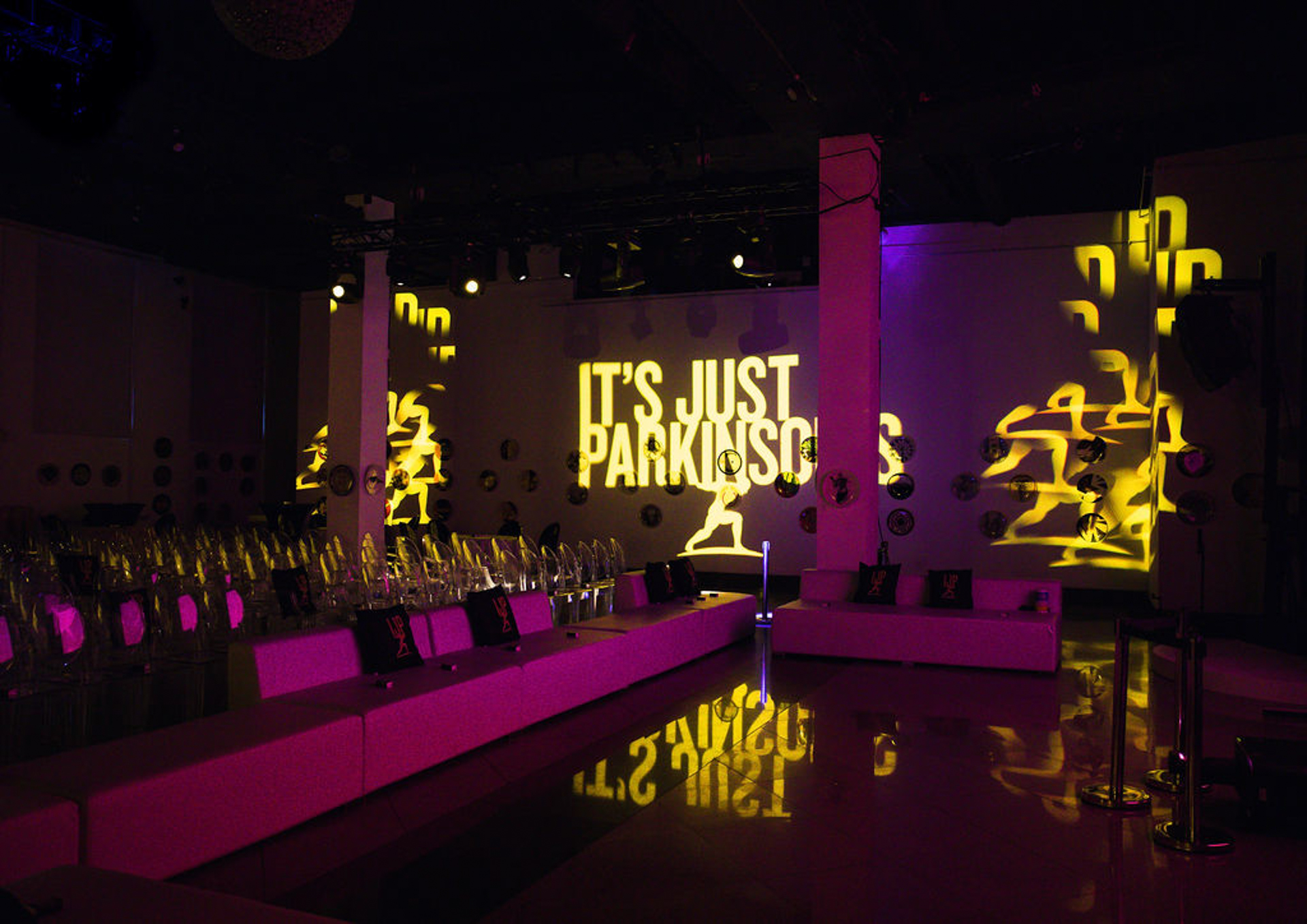 Dynamic lighting setup at an event by HotHouse AV, showcasing vibrant colors and visual effects to enhance the atmosphere and guest experience.