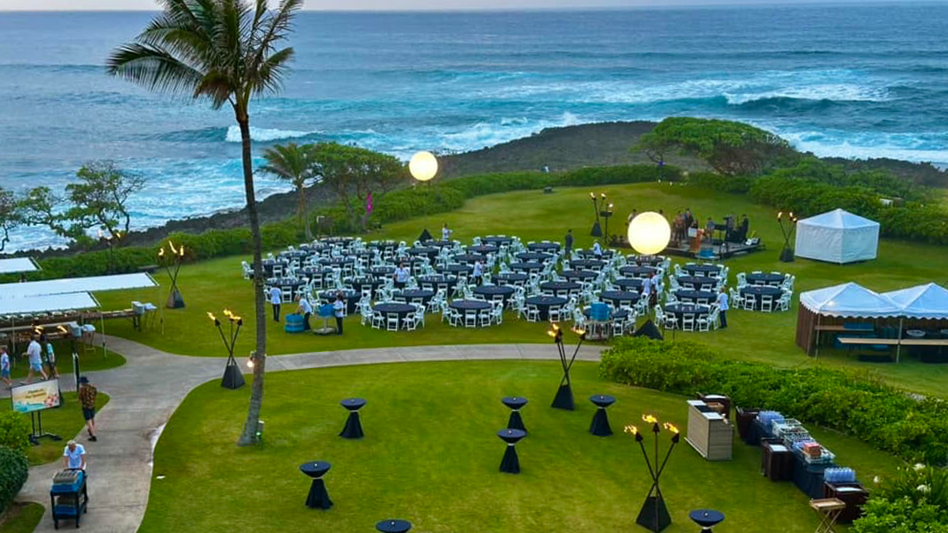 AirStar Light Balloon set up at a night event, casting a soft glow over an elegantly arranged outdoor venue.
